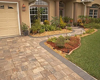Paver Installations, Boca Raton FL A paver driveway with a walkway leading to the home entrance