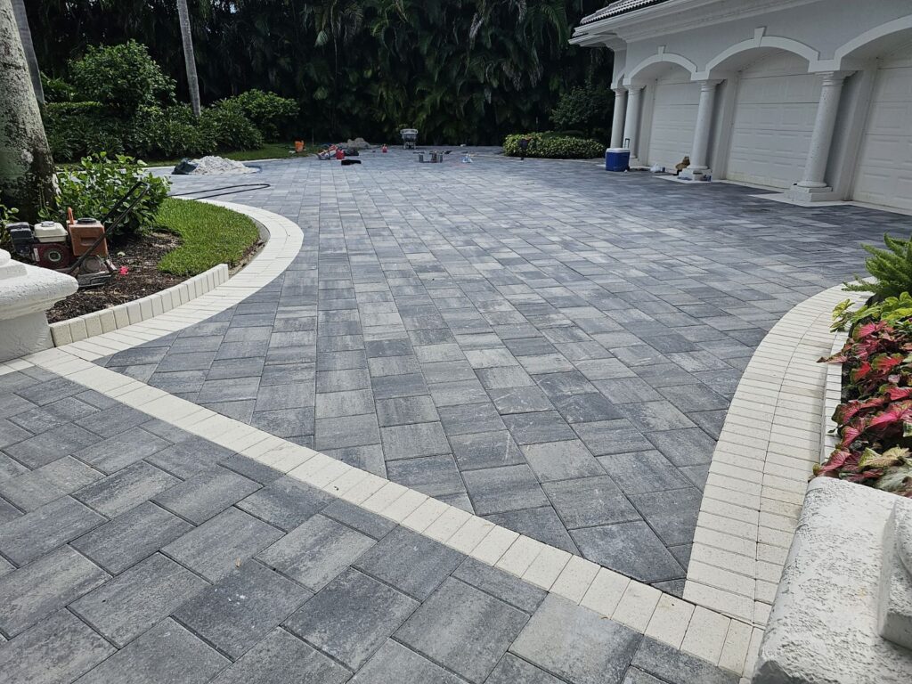A hardscaping surface installed with brick pavers