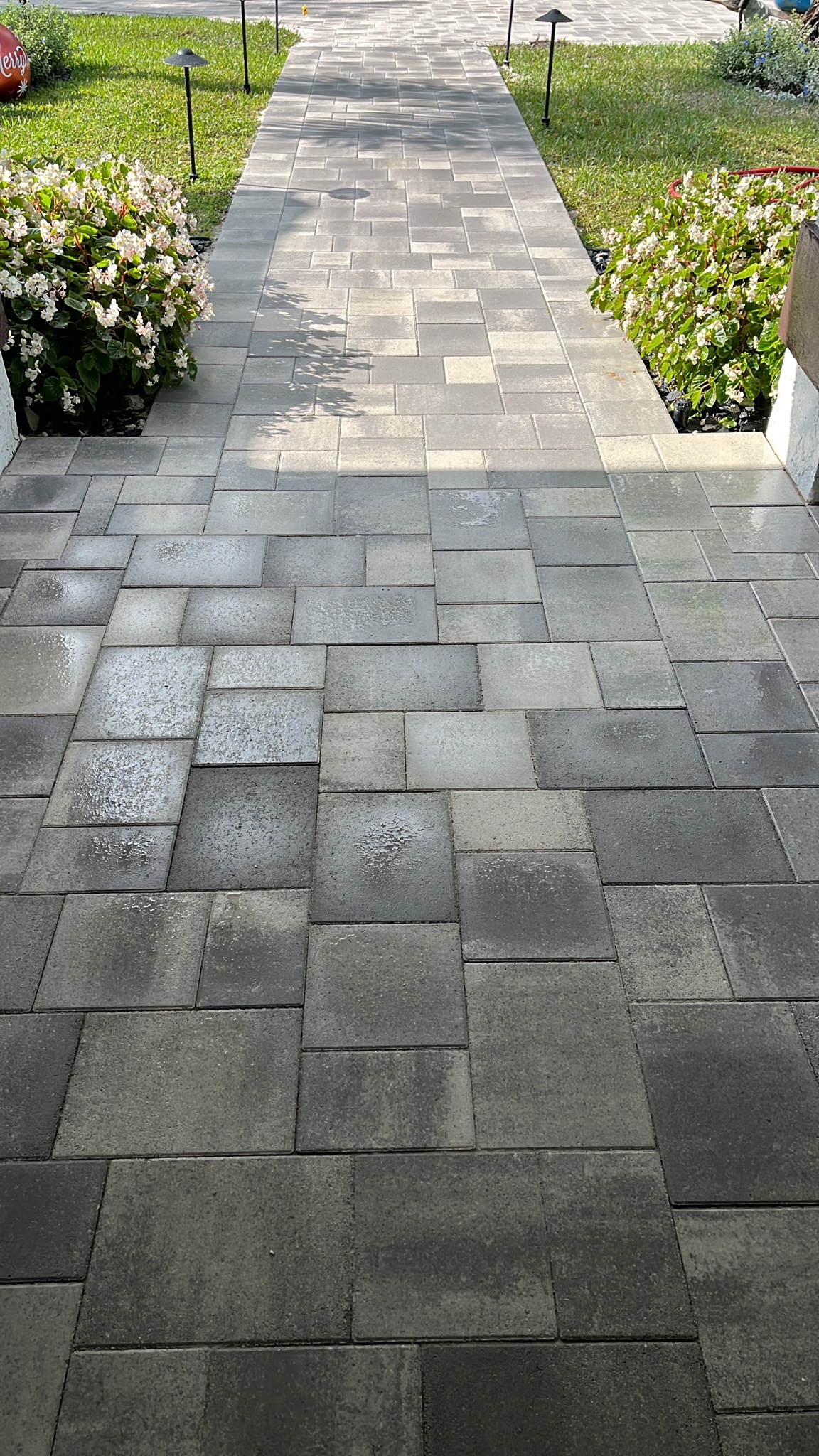 Brick pavers leading to a front door