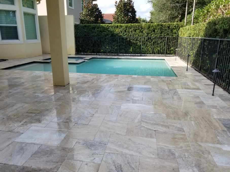 Marble pavers by a pool.