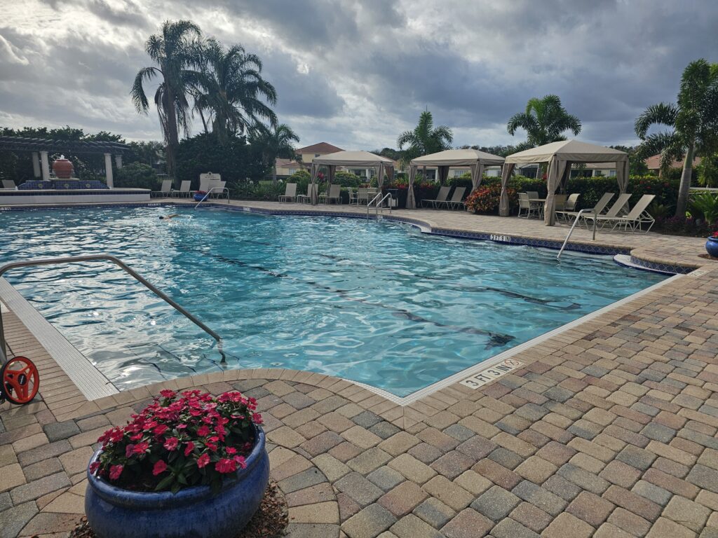 Brick pavers around a pool