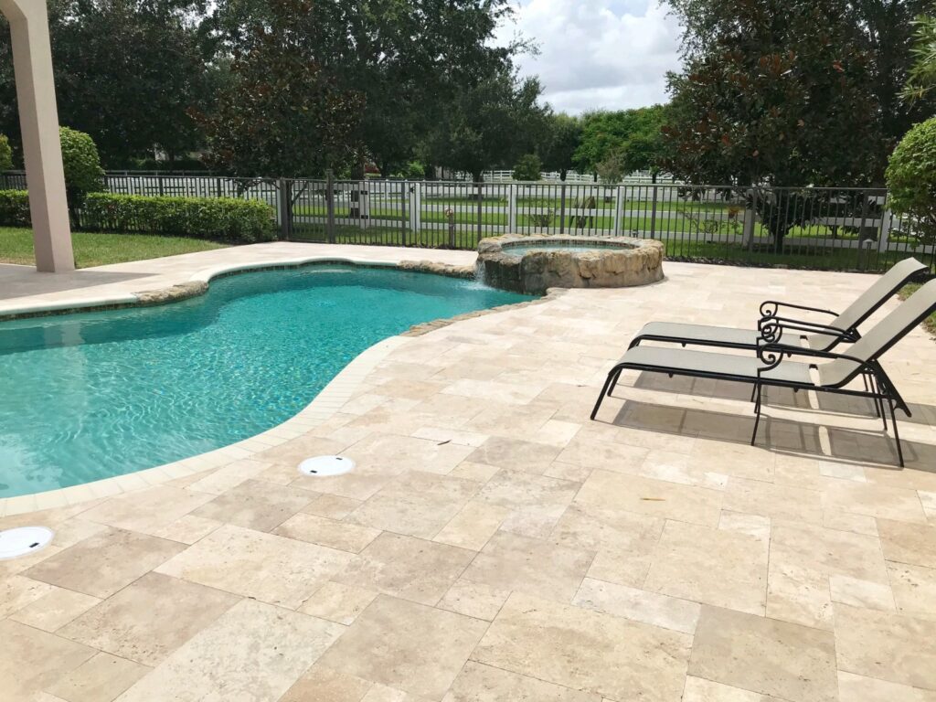 Marble pavers form a stunning pool surrounding