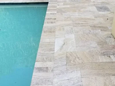 Pool deck pavers installed by professional installation services in Lake Worth, FL